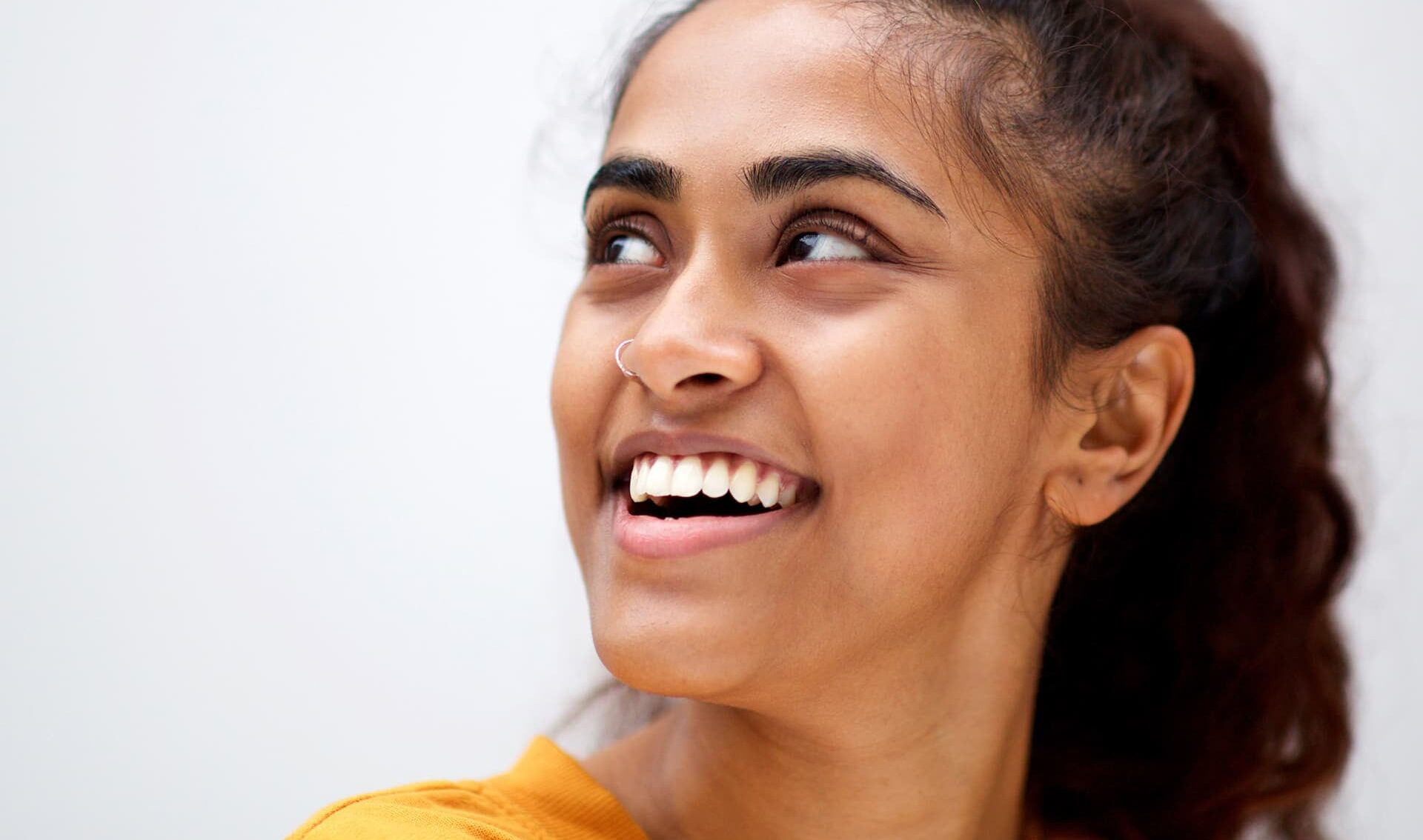 Explore cosmetic dental treatments designed to boost your daily confidence with subtle, natural-looking results that reflect who you are.